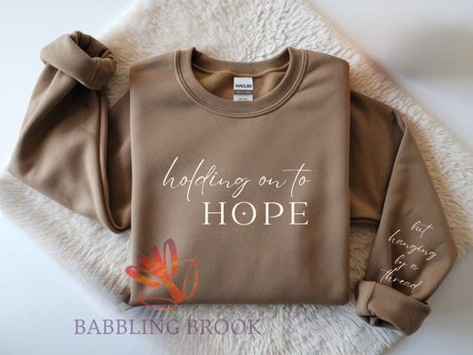 Holding on to Hope, But Hanging By a Thread Sweatshirt